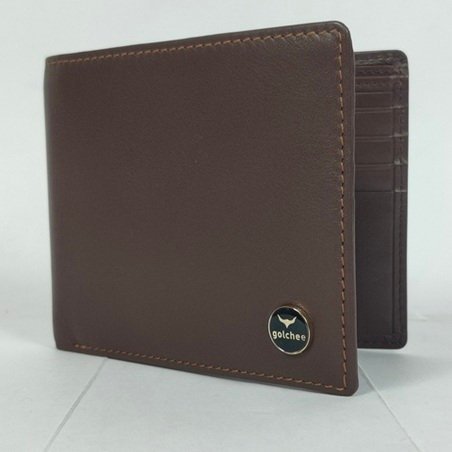 Brown leather wallet with a round black and gold metal logo badge