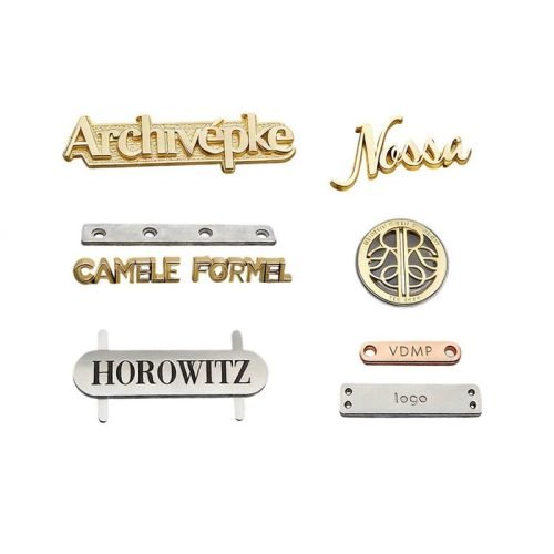 Custom metal labels with raised lettering, detailed logos and different shapes